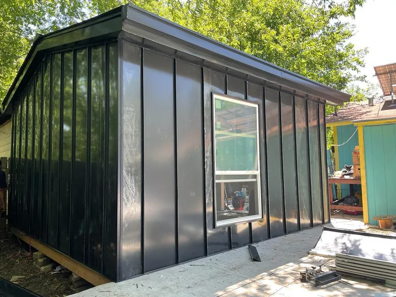 Black standing seam metal wall panels for Roof Inspection in Calumet Park